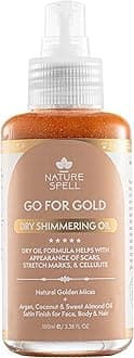 – Nature Spell Dry Shimmering Oil for Body & Face, Lightweight, Glowy Finish, Infused With Argan and Coconut Oils, Vegan, 100ml